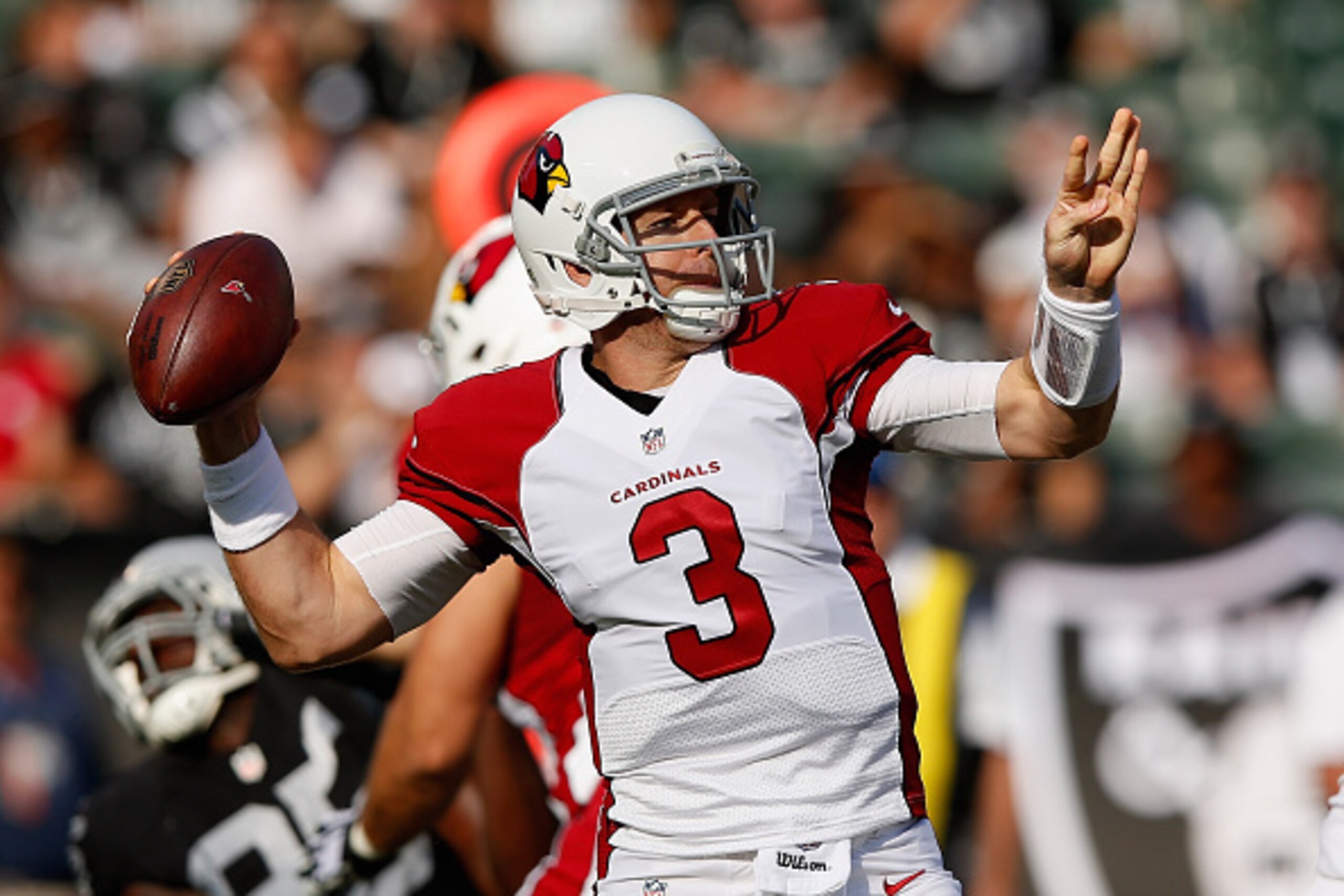 OAKLAND, CA - AUGUST 30:  Carson Palmer #3 of the Arizona Cardinals throws the ball against the Oakland Raiders at O.co Coliseum on August 30, 2015 in Oakland, California.  (Photo by Ezra Shaw/Getty Images)