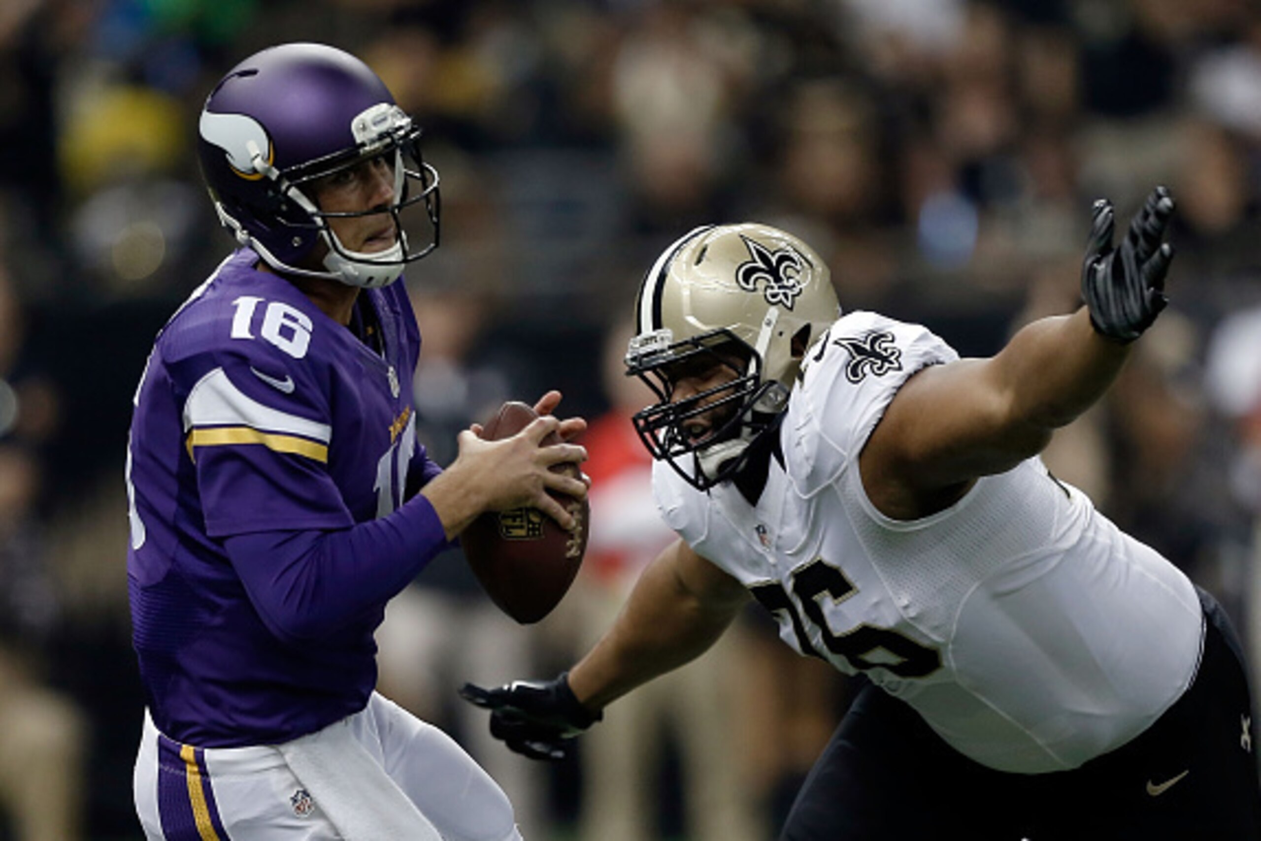 NEW ORLEANS, LA - SEPTEMBER 21:  Akiem Hicks #76 of the New Orleans Saints pressures Matt Cassel #16 of the Minnesota Vikings during the first quarter of a game at the Mercedes-Benz Superdome on September 21, 2014 in New Orleans, Louisiana.  (Photo by Sea