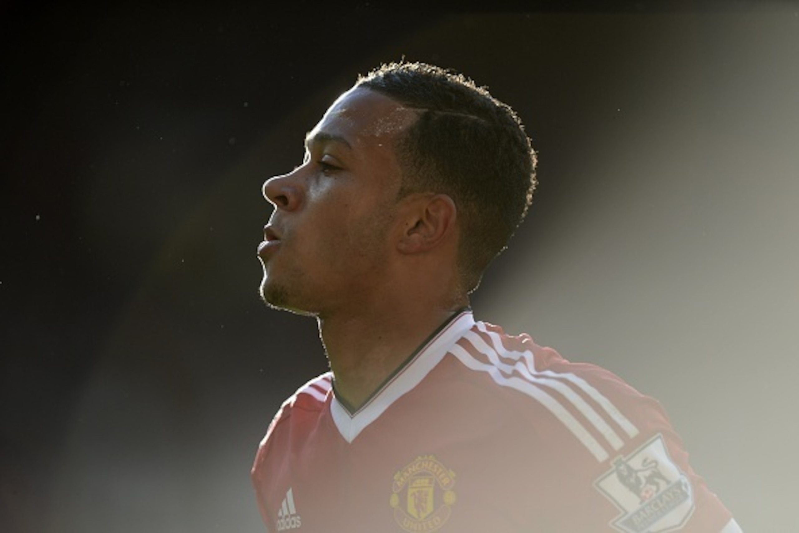 Manchester United's Dutch midfielder Memphis Depay plays during the English Premier League football match between Manchester United and Liverpool at Old Trafford in Manchester, north west England, on September 12, 2015. AFP PHOTO / OLI SCARFF

RESTRICTED 