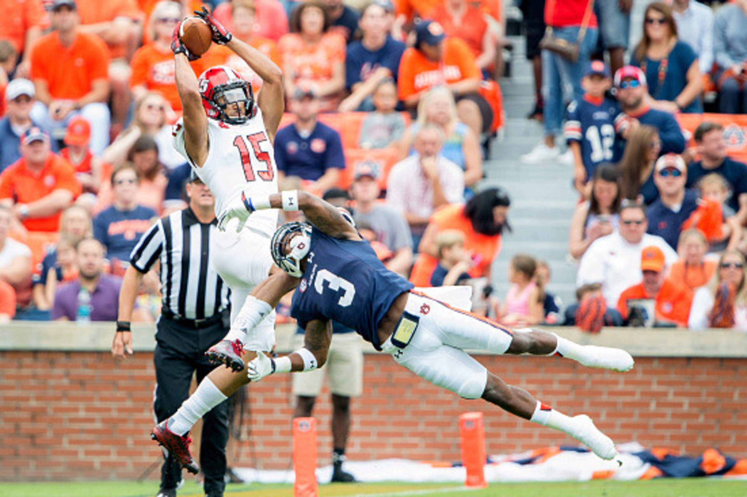 AUBURN, AL - SEPTEMBER 12: Wide receiver Ruben Gonzalez #15 of the Jacksonville State Gamecocks catches a pass over defensive back Jonathan Jones #3 of the Auburn Tigers on September 12, 2015 at Jordan-Hare Stadium in Auburn, Alabama. (Photo by Michael C AUBURN, AL - SEPTEMBER 12: Wide receiver Ruben Gonzalez #15 of the Jacksonville State Gamecocks catches a pass over defensive back Jonathan Jones #3 of the Auburn Tigers on September 12, 2015 at Jordan-Hare Stadium in Auburn, Alabama. (Photo by Michael C