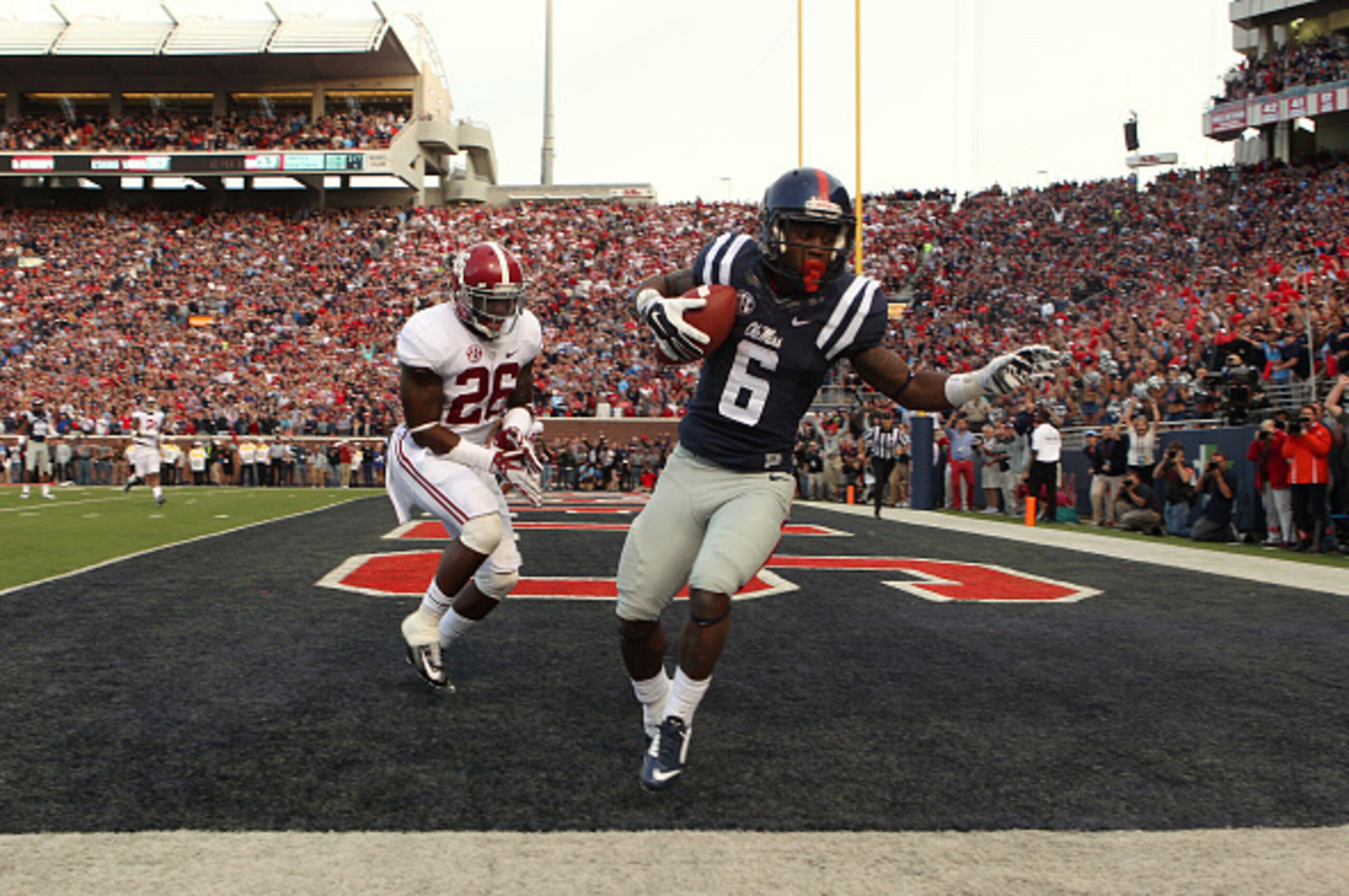 OXFORD, MS - OCTOBER 4: Jaylen Walton #6 of the Ole Miss Rebels catches a touchdown pass against Landon Collins #26 of the Alabama Crimson Tide on OCTOBER 4, 2014 at Vaught-Hemingway Stadium in Oxford, Mississippi. Mississippi beat Alabama 23-17. (Photo b OXFORD, MS - OCTOBER 4: Jaylen Walton #6 of the Ole Miss Rebels catches a touchdown pass against Landon Collins #26 of the Alabama Crimson Tide on OCTOBER 4, 2014 at Vaught-Hemingway Stadium in Oxford, Mississippi. Mississippi beat Alabama 23-17. (Photo b