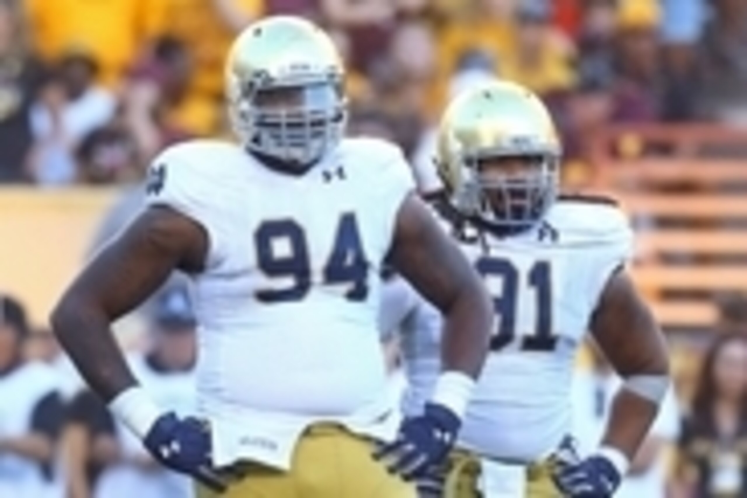 Nov 8, 2014; Tempe, AZ, USA; Notre Dame Fighting Irish defensive lineman Jarron Jones (94) and defensive lineman Sheldon Day (91) against the Arizona State Sun Devils at Sun Devil Stadium. Arizona State defeated Notre Dame 55-31. Mandatory Credit: Mark J.