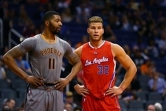 Apr 14, 2015; Phoenix, AZ, USA; Phoenix Suns forward Markieff Morris (left) against Los Angeles Clippers forward Blake Griffin at US Airways Center. The Clippers beat the Suns 112-101. Mandatory Credit: Mark J. Rebilas-USA TODAY Sports