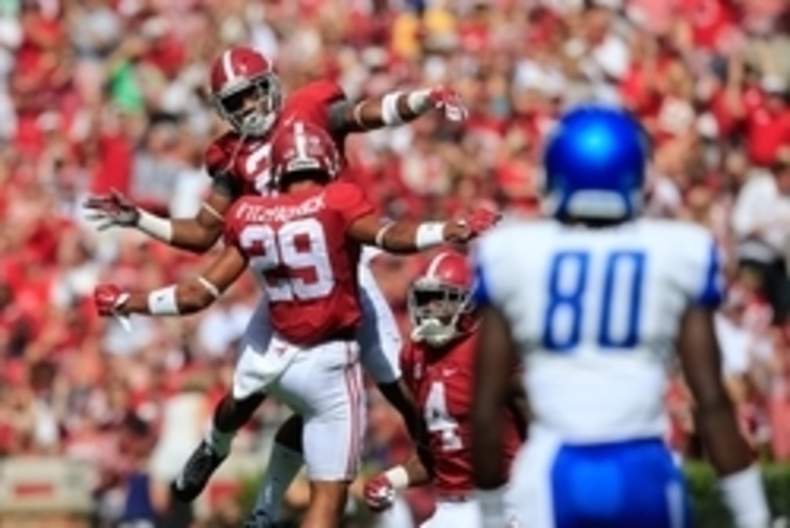 Sep 12, 2015; Tuscaloosa, AL, USA;  Alabama Crimson Tide defensive back Marlon Humphrey (26) celebrates with defensive back Minkah Fitzpatrick (29) after he recovered a fumble of Middle Tennessee Blue Raiders during the first quarter at Bryant-Denny Stadi