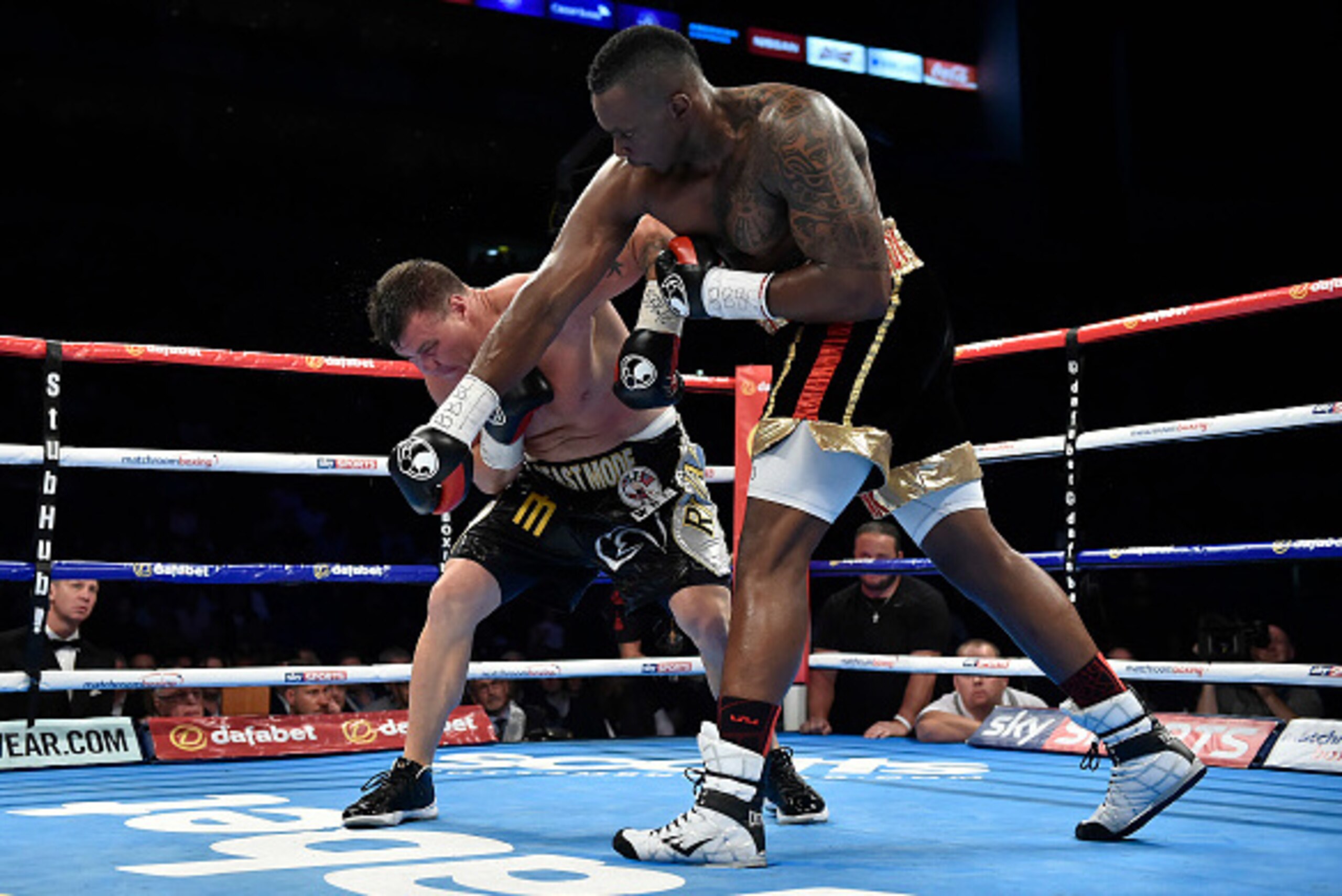 LONDON, ENGLAND - SEPTEMBER 12:  Dillian Whyte throws a right hand punch on Brian Minto in the Vacant WBC International Silver Heavyweight title contest during 'Heavy Duty' fight night at The O2 Arena on September 12, 2015 in London, England.  (Photo by L