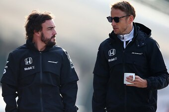 SHANGHAI, CHINA - APRIL 10:  Fernando Alonso of Spain and McLaren Honda and Jenson Button of Great Britain and McLaren Honda walk through the paddock during practice for the Formula One Grand Prix of China at Shanghai International Circuit on April 10, 20