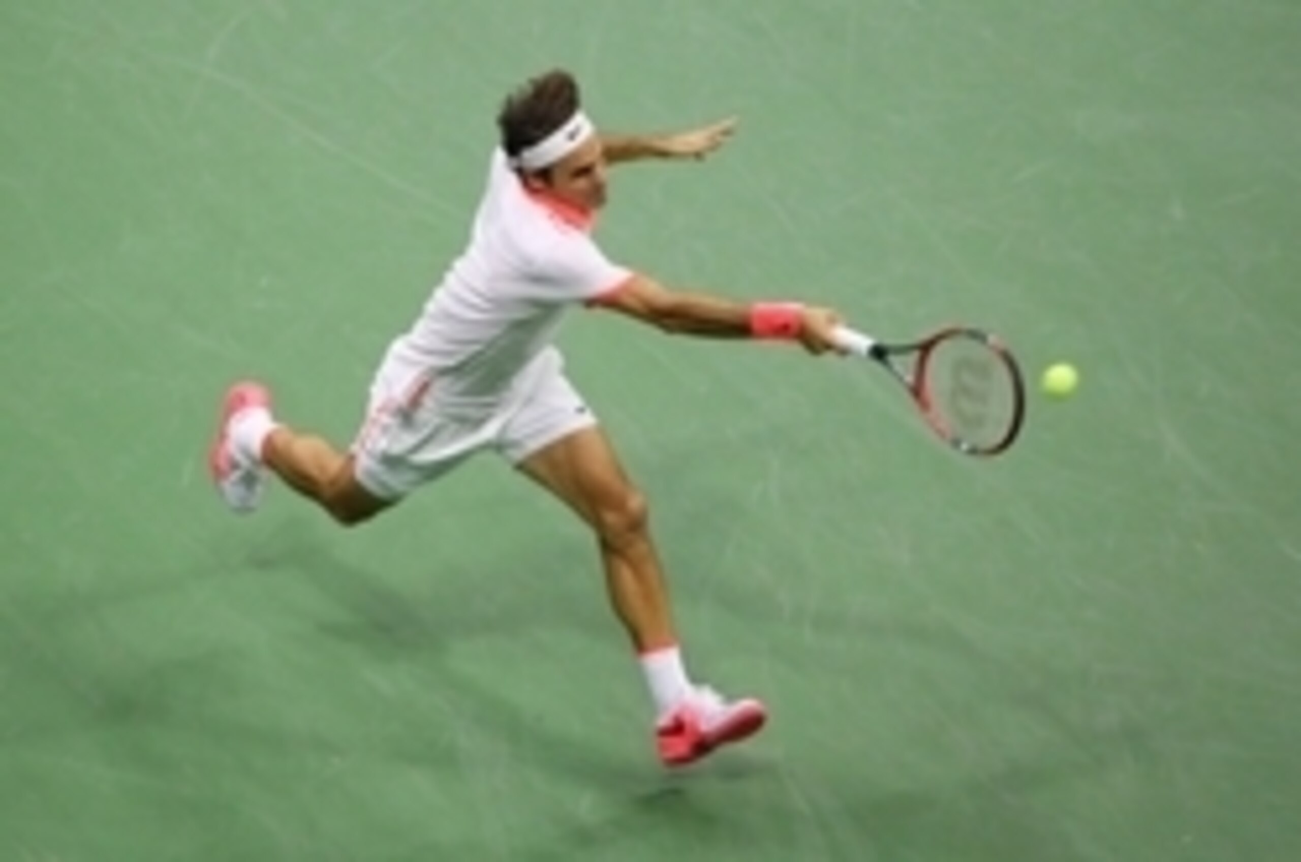 Sep 11, 2015; New York, NY, USA; Roger Federer of Switzerland returns a shot to Stan Wawrinka of Switzerland on day twelve of the 2015 U.S. Open tennis tournament at USTA Billie Jean King National Tennis Center. Mandatory Credit: Anthony Gruppuso-USA TODA