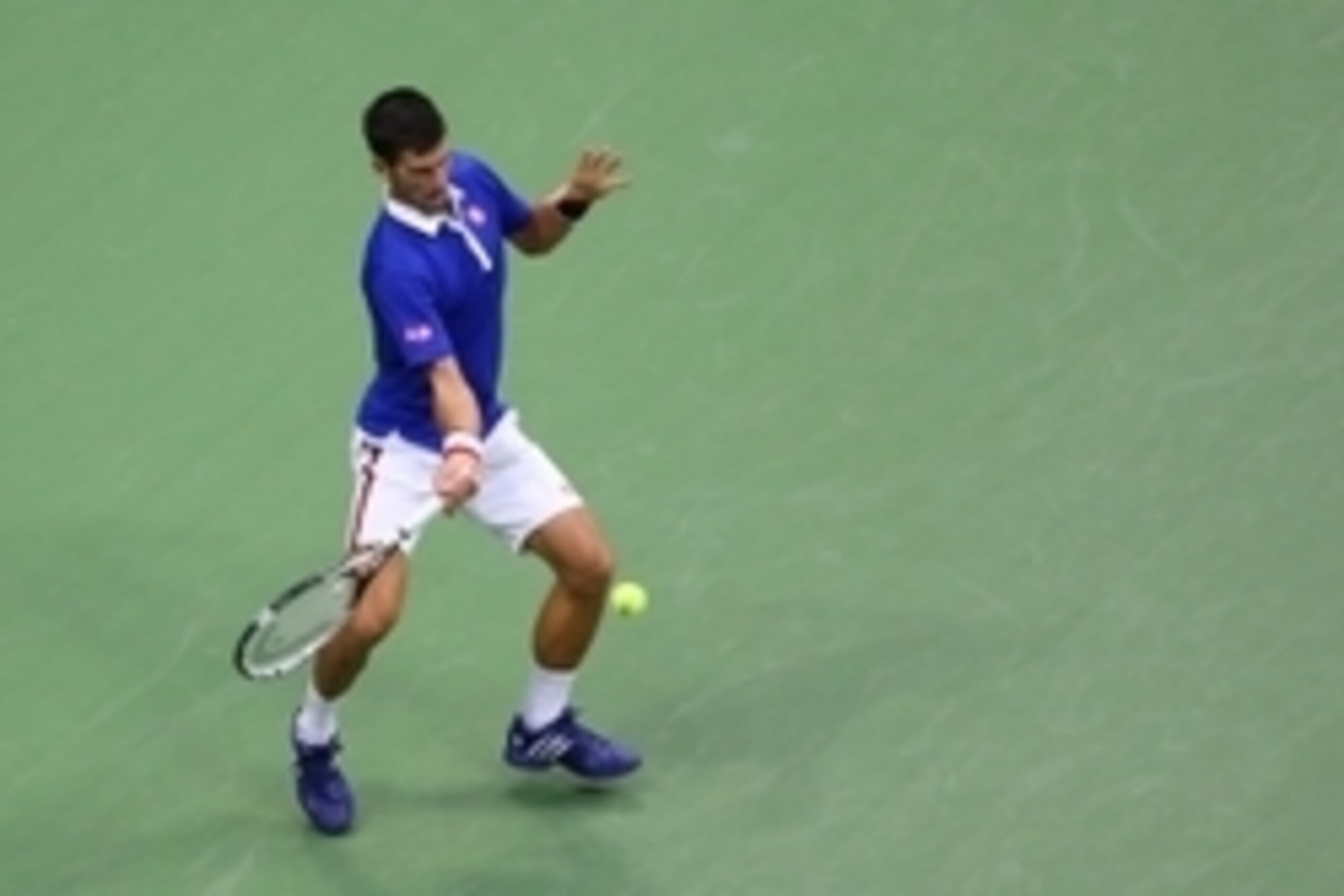Sep 11, 2015; New York, NY, USA; Novak Djokovic of Serbia returns a shot to Marin Cilic of Croatia on day twelve of the 2015 U.S. Open tennis tournament at USTA Billie Jean King National Tennis Center. Mandatory Credit: Anthony Gruppuso-USA TODAY Sports