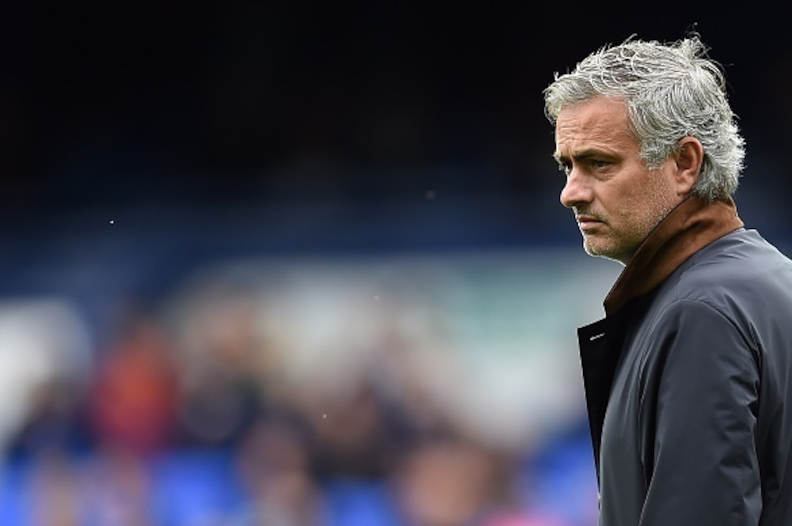 Chelsea's Portuguese manager Jose Mourinho watches his players as they warm up ahead of the English Premier League football match between Everton and Chelsea at Goodison Park in Liverpool on September 12, 2015. Everton won the match 3-1.   AFP PHOTO / PAU