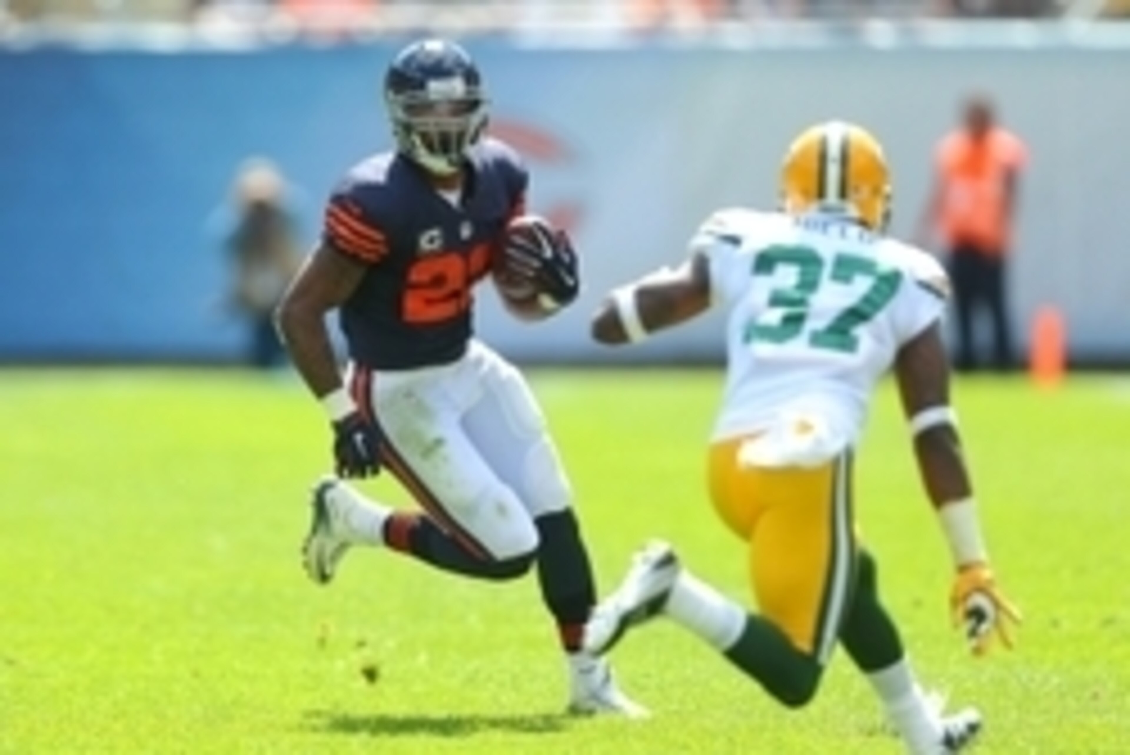 Sep 13, 2015; Chicago, IL, USA; Chicago Bears running back Matt Forte (22) runs against Green Bay Packers cornerback Sam Shields (37) during the second quarter at Soldier Field. Mandatory Credit: Dennis Wierzbicki-USA TODAY Sports