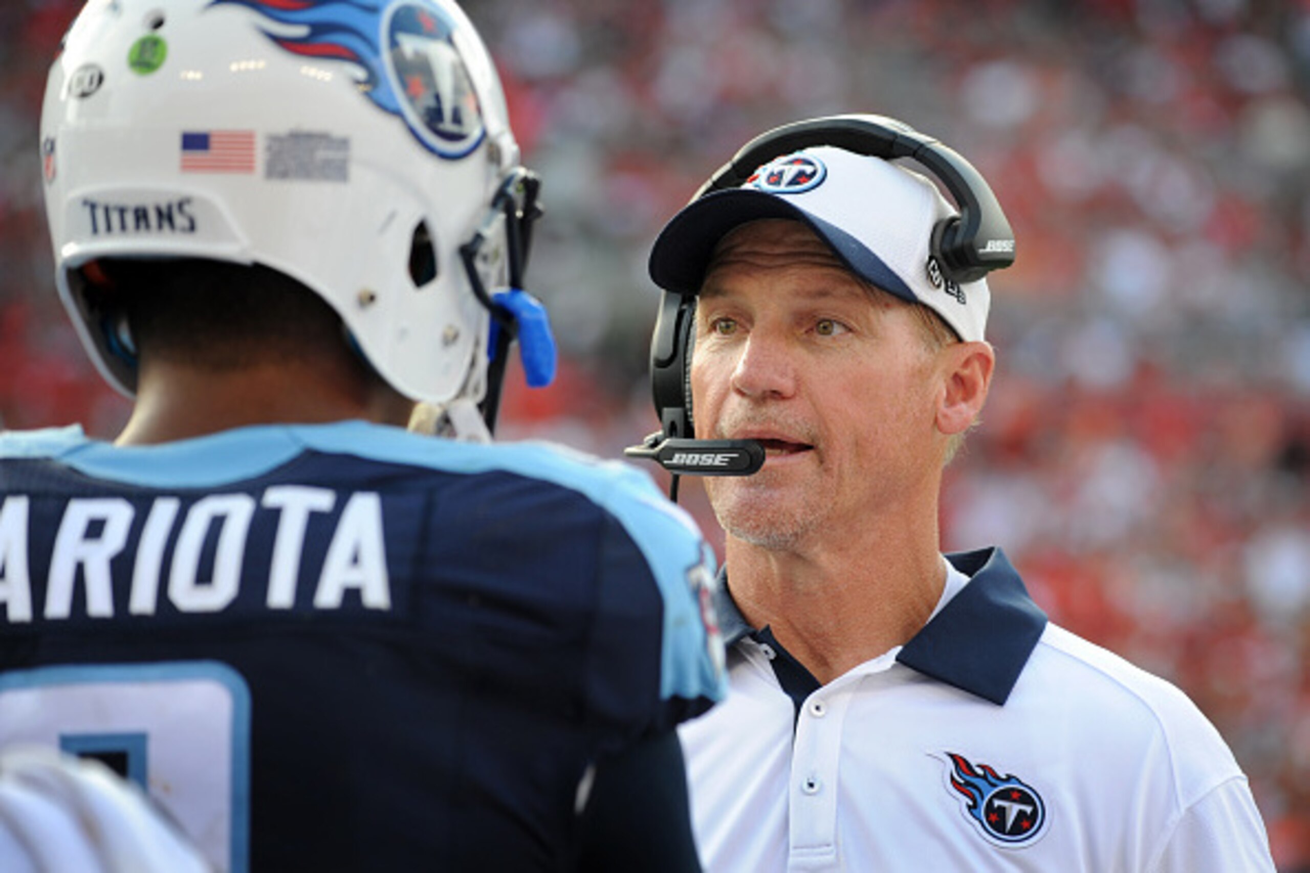 TAMPA, FL - SEPTEMBER 13: Head coach Ken Whisenhunt of the Tennessee Titans talks with quarterback Marcus Mariota #8 of the Tennessee Titans after he threw a touchdown in the 2nd quarter against the Tampa Bay Buccaneers at Raymond James Stadium on Septemb TAMPA, FL - SEPTEMBER 13: Head coach Ken Whisenhunt of the Tennessee Titans talks with quarterback Marcus Mariota #8 of the Tennessee Titans after he threw a touchdown in the 2nd quarter against the Tampa Bay Buccaneers at Raymond James Stadium on Septemb