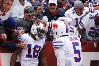ORCHARD PARK, NY - SEPTEMBER 13:  Percy Harvin #18 of the Buffalo Bills celebrates his touchdown with  Tyrod Taylor #5 of the Buffalo Bills against the Indianapolis Colts during the first half at Ralph Wilson Stadium on September 13, 2015 in Orchard Park,