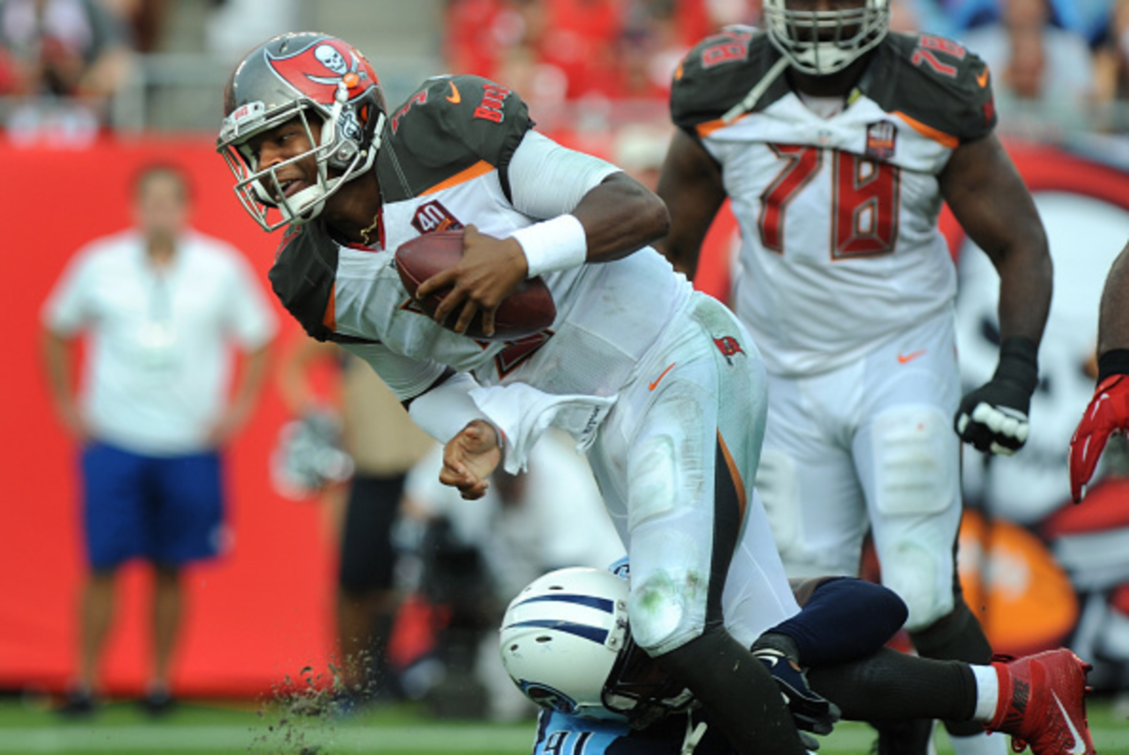 TAMPA, FL - SEPTEMBER 13: Quarterback Jameis Winston #3 of the Tampa Bay Buccaneers is sacked by outside linebacker Derrick Morgan #91 of the Tennessee Titans in the fourth quarter at Raymond James Stadium on September 13, 2015 in Tampa, Florida. (Photo b TAMPA, FL - SEPTEMBER 13: Quarterback Jameis Winston #3 of the Tampa Bay Buccaneers is sacked by outside linebacker Derrick Morgan #91 of the Tennessee Titans in the fourth quarter at Raymond James Stadium on September 13, 2015 in Tampa, Florida. (Photo b