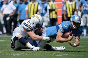 SAN DIEGO, CA - SEPTEMBER 13:  Linebacker Kyle Emanuel #51 of the San Diego Chargers sacks quarterback Matthew Stafford #9 of the Detroit Lions at Qualcomm Stadium on September 13, 2015 in San Diego, California.  (Photo by Donald Miralle/Getty Images)