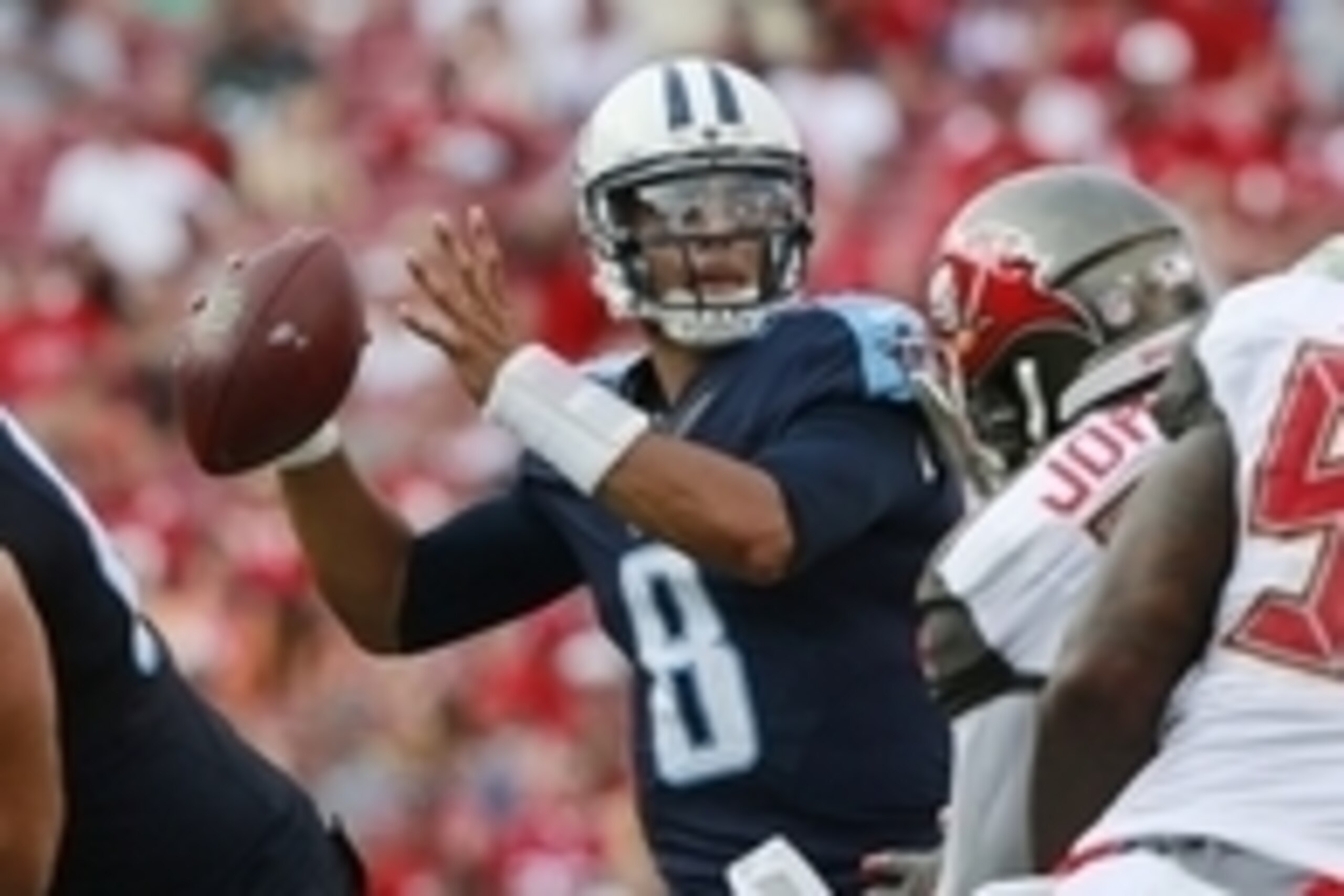 Sep 13, 2015; Tampa, FL, USA; Tennessee Titans quarterback Marcus Mariota (8) throws the ball against the Tampa Bay Buccaneers during the second half at Raymond James Stadium.  Tennessee Titans defeated the Tampa Bay Buccaneers 42-14. Mandatory Credit: Ki