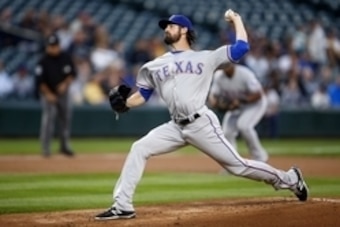 Sep 8, 2015; Seattle, WA, USA; Texas Rangers pitcher Cole Hamels (35) throws against the Seattle Mariners during the first inning at Safeco Field. Mandatory Credit: Joe Nicholson-USA TODAY Sports