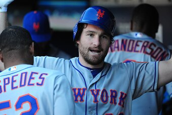 ATLANTA, GA - SEPTEMBER 13: Daniel Murphy #28 of the New York Mets celebrates with teammates after hitting a three-run ninth inning home run against the Atlanta Braves at Turner Field on September 13, 2015 in Atlanta, Georgia. (Photo by Scott Cunningham/G