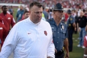 Sep 12, 2015; Little Rock, AR, USA; Arkansas Razorbacks head coach Bret Bielema leaves the field after action against the Toledo Rockets War Memorial Stadium. The Rockets defeated the Razorbacks 16-12. Mandatory Credit: Mark D. Smith-USA TODAY Sports
