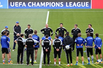 LISBON, PORTUGAL - SEPTEMBER 14:  FC Astana's coach Stanimir Stoilov talks to players during FC Astana Training Session before the UEFA Champions League match between SL Benfica and FC Astana at Estadio da Luz on September, 2015 in Lisbon, Portugal.  (Pho