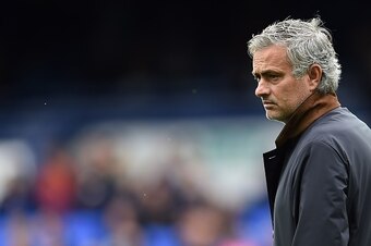 Chelsea's Portuguese manager Jose Mourinho watches his players as they warm up ahead of the English Premier League football match between Everton and Chelsea at Goodison Park in Liverpool on September 12, 2015. Everton won the match 3-1.   AFP PHOTO / PAU