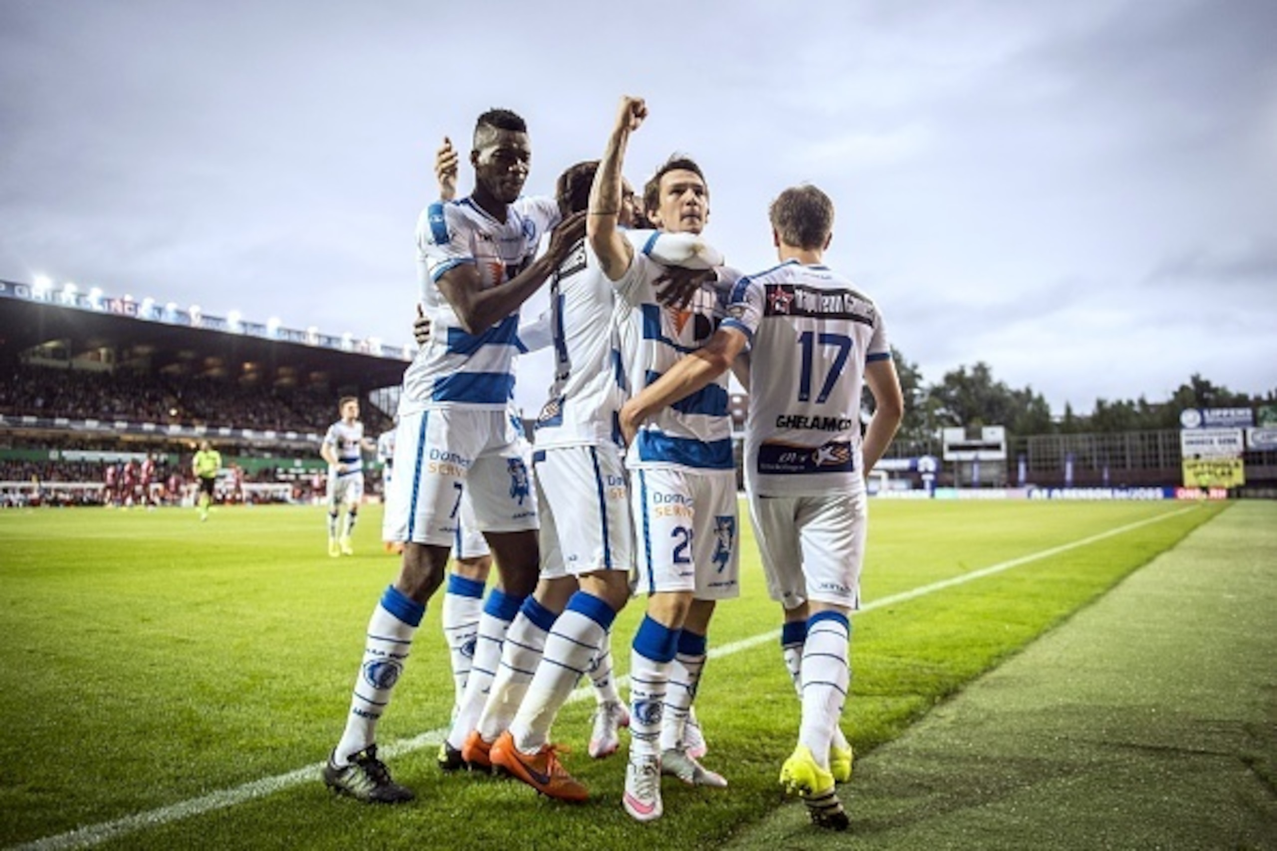 Gent's Benito Raman (2nd R) celebrates after scoring during the Belgian Jupiler Pro League football match between Zulte Waregem and KAA Gent in Waregem on September 12, 2015. AFP PHOTO / BELGA / JASPER JACOBS

--BELGIUM OUT--        (Photo credit should r