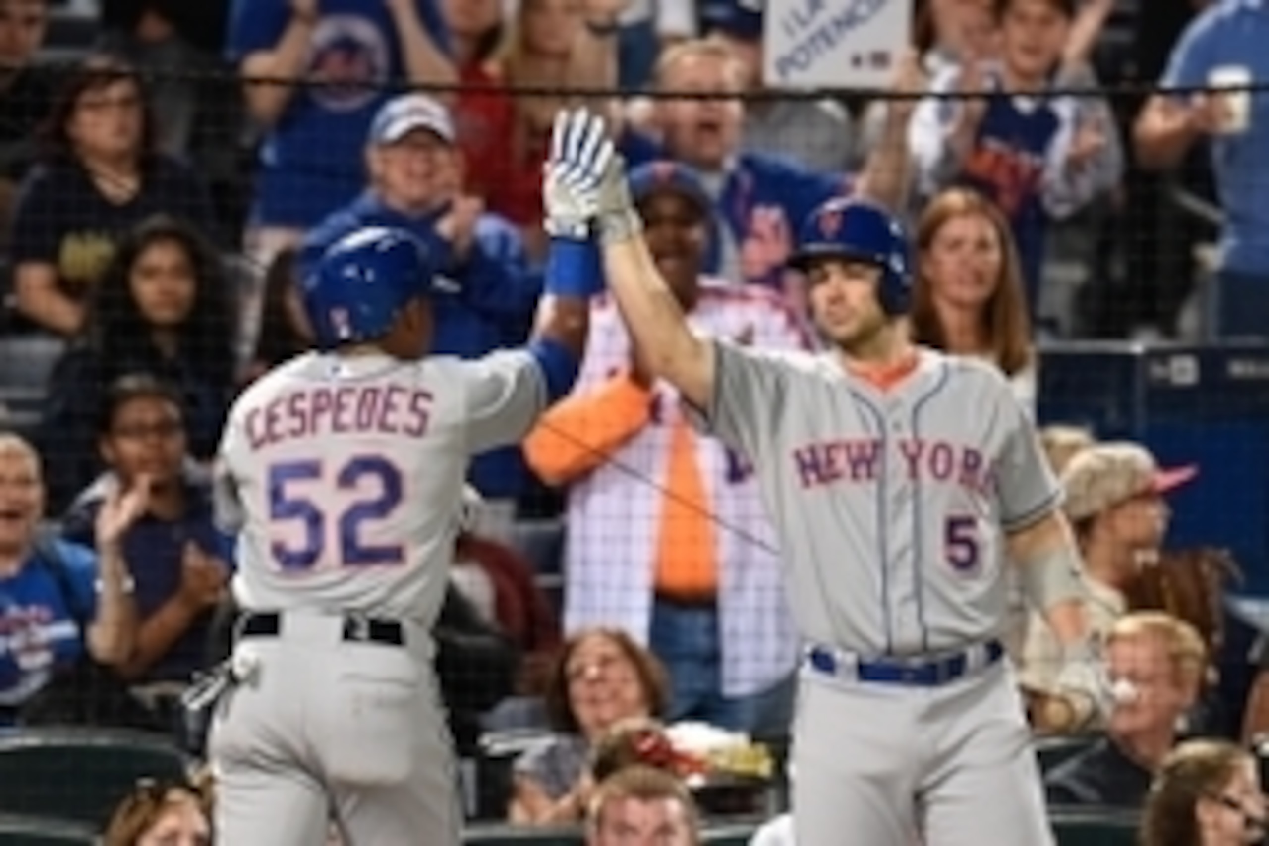Sep 12, 2015; Atlanta, GA, USA; New York Mets center fielder Yoenis Cespedes (52) high fives with third baseman David Wright (5) after hitting a home run against the Atlanta Braves during the eighth inning at Turner Field. Mandatory Credit: Dale Zanine-US Sep 12, 2015; Atlanta, GA, USA; New York Mets center fielder Yoenis Cespedes (52) high fives with third baseman David Wright (5) after hitting a home run against the Atlanta Braves during the eighth inning at Turner Field. Mandatory Credit: Dale Zanine-US