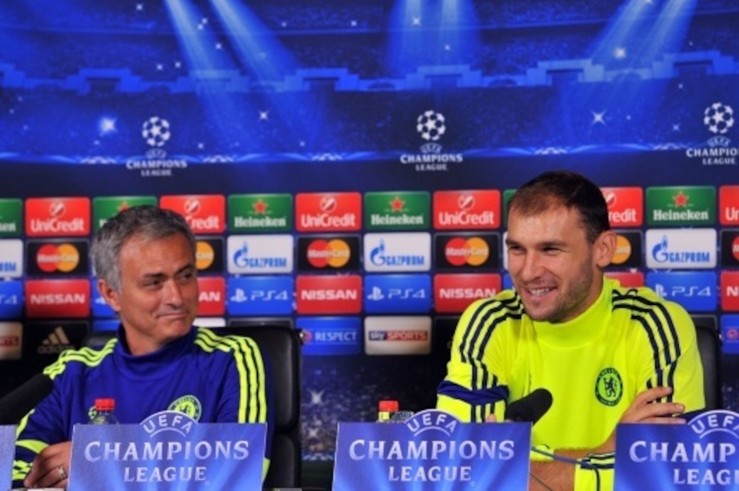 Chelsea's Portuguese manager Jose Mourinho (L) and Serbian defender Branislav Ivanovic (R) attend a press conference ahead of their UEFA Champions League, group G football match against Schalke 04 at Chelsea's training ground, Stoke D'Abernon, southwest o