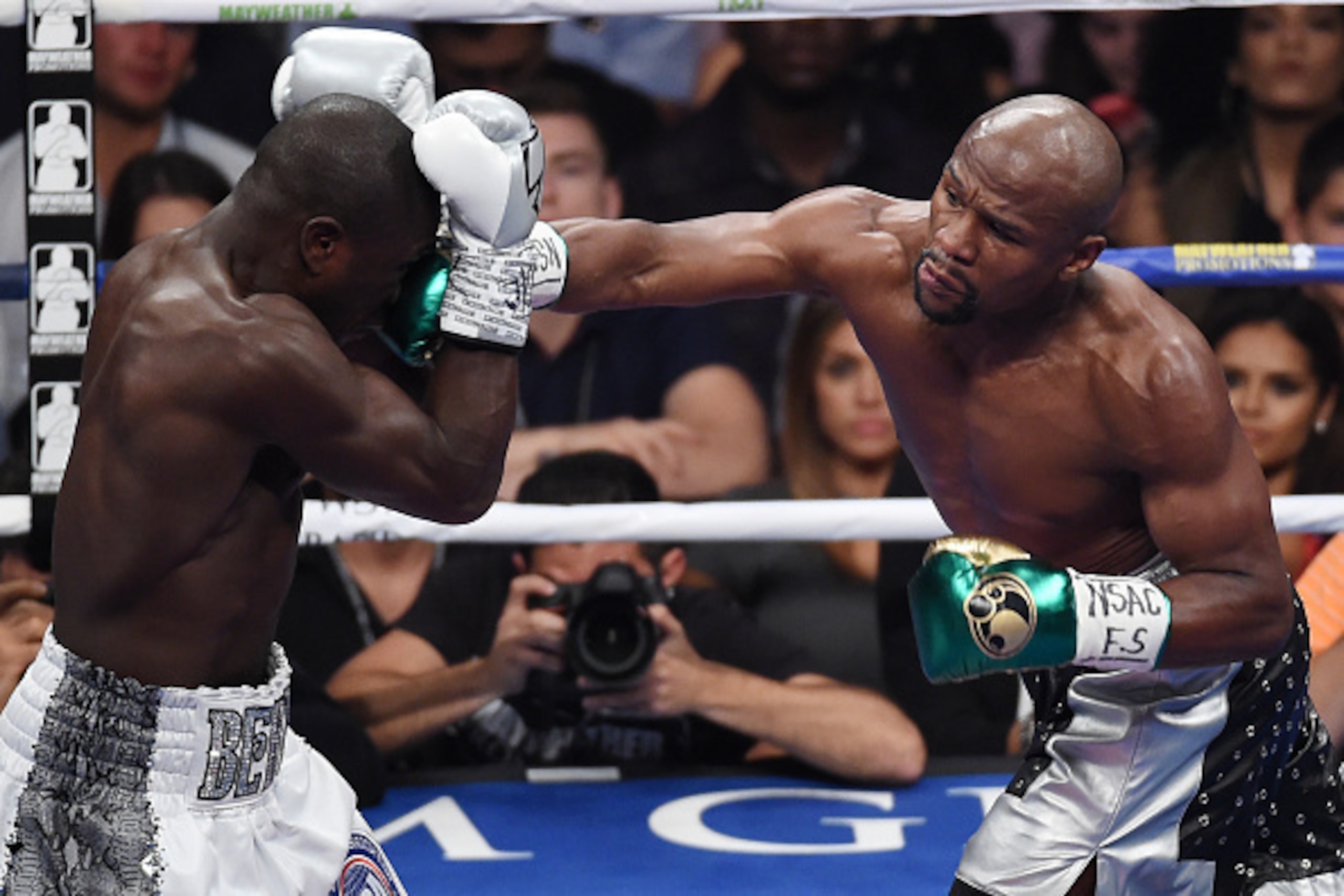 LAS VEGAS, NV - SEPTEMBER 12:  Floyd Mayweather Jr. throws a right at Andre Berto during their WBC/WBA welterweight title fight at MGM Grand Garden Arena on September 12, 2015 in Las Vegas, Nevada.  (Photo by Ethan Miller/Getty Images)