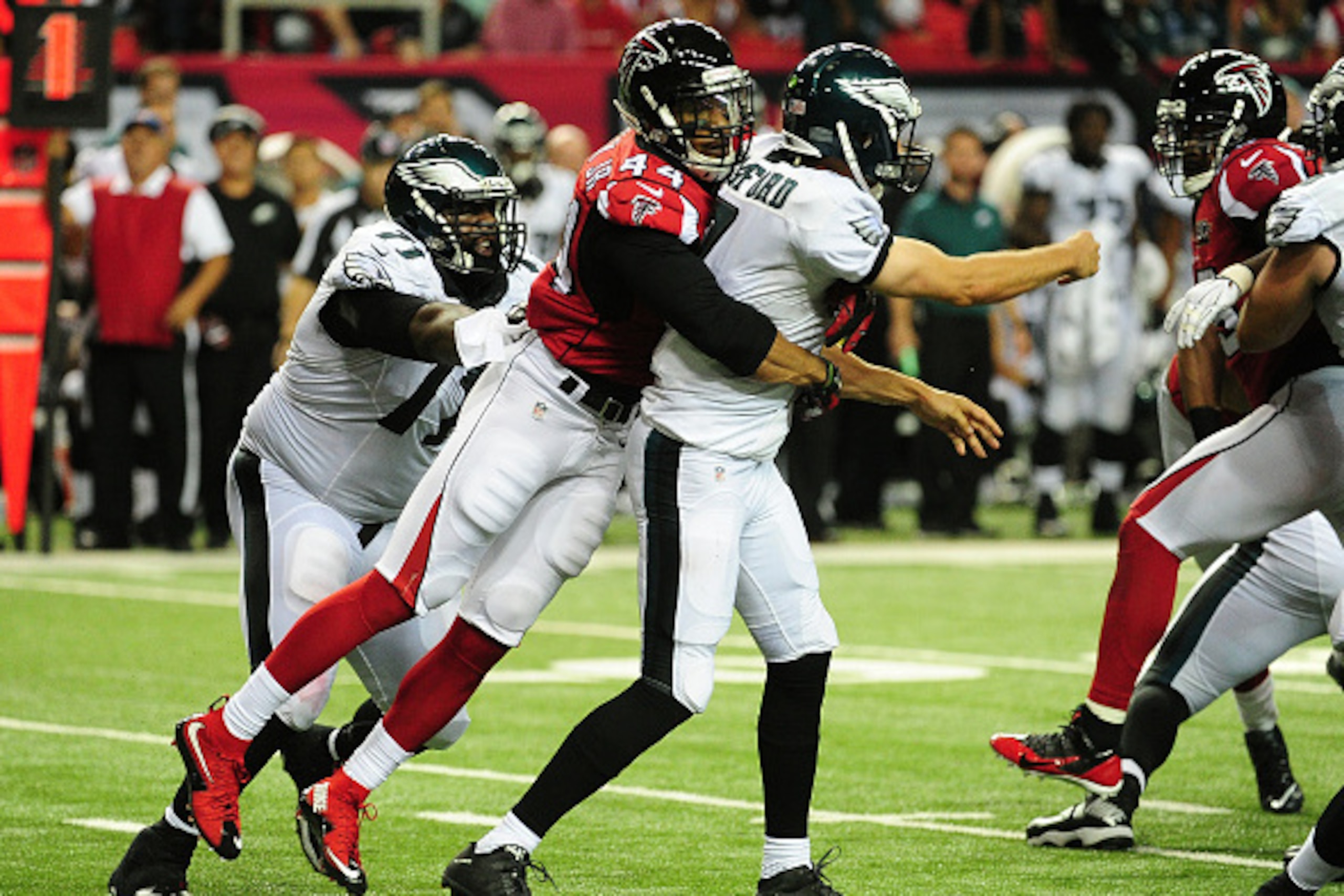 ATLANTA, GA - SEPTEMBER 14: Sam Bradford #7 of the Philadelphia Eagles has his pass deflected by Vic Beasley, Jr. #44 of the Atlanta Falcons at the Georgia Dome on September 14, 2015 in Atlanta, Georgia. (Photo by Scott Cunningham/Getty Images)