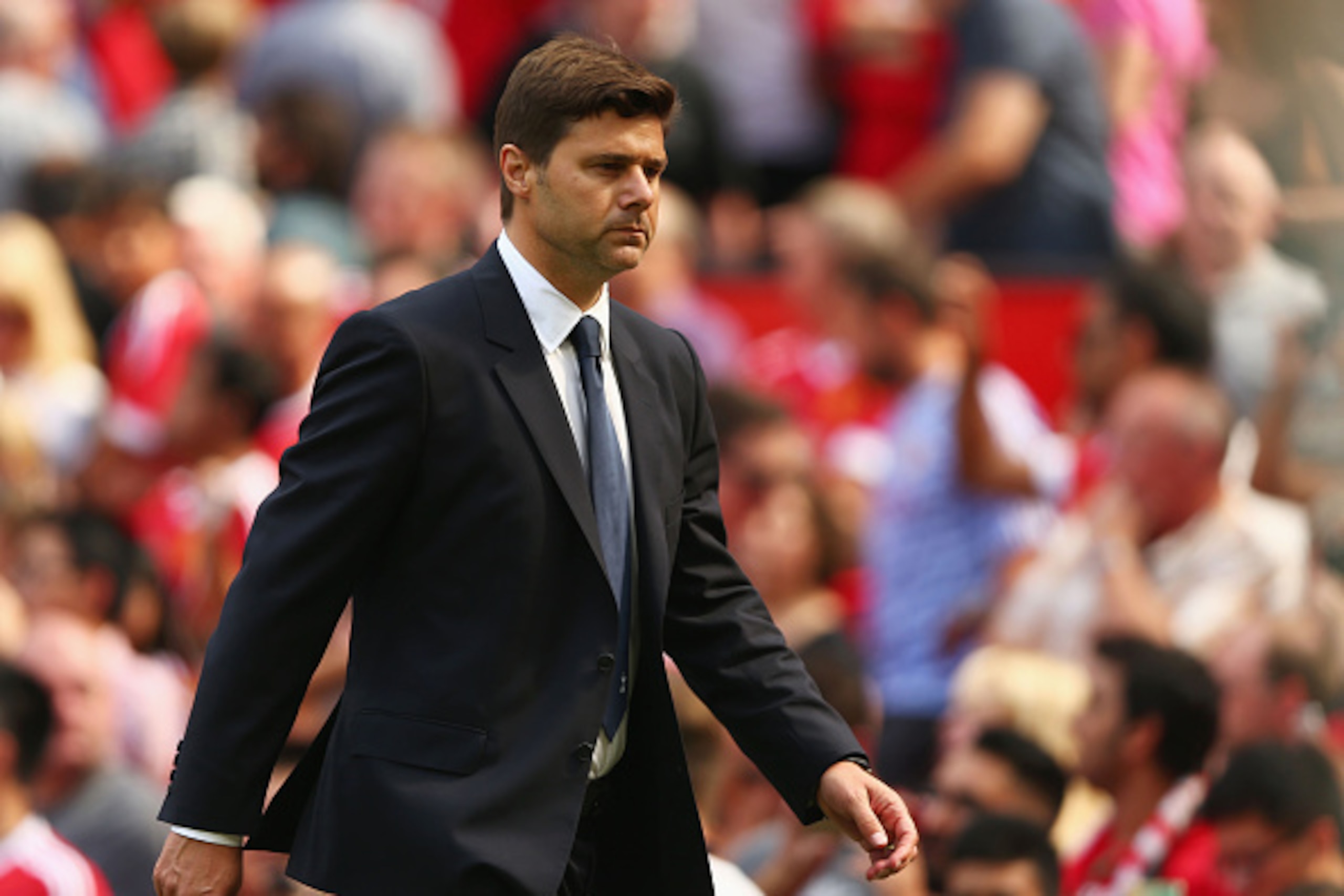 MANCHESTER, ENGLAND - AUGUST 08:  Mauricio Pochettino manager of Tottenham Hotspur looks to the ground during the Barclays Premier League match between Manchester United and Tottenham Hotspur at Old Trafford on August 8, 2015 in Manchester, England.  (Pho