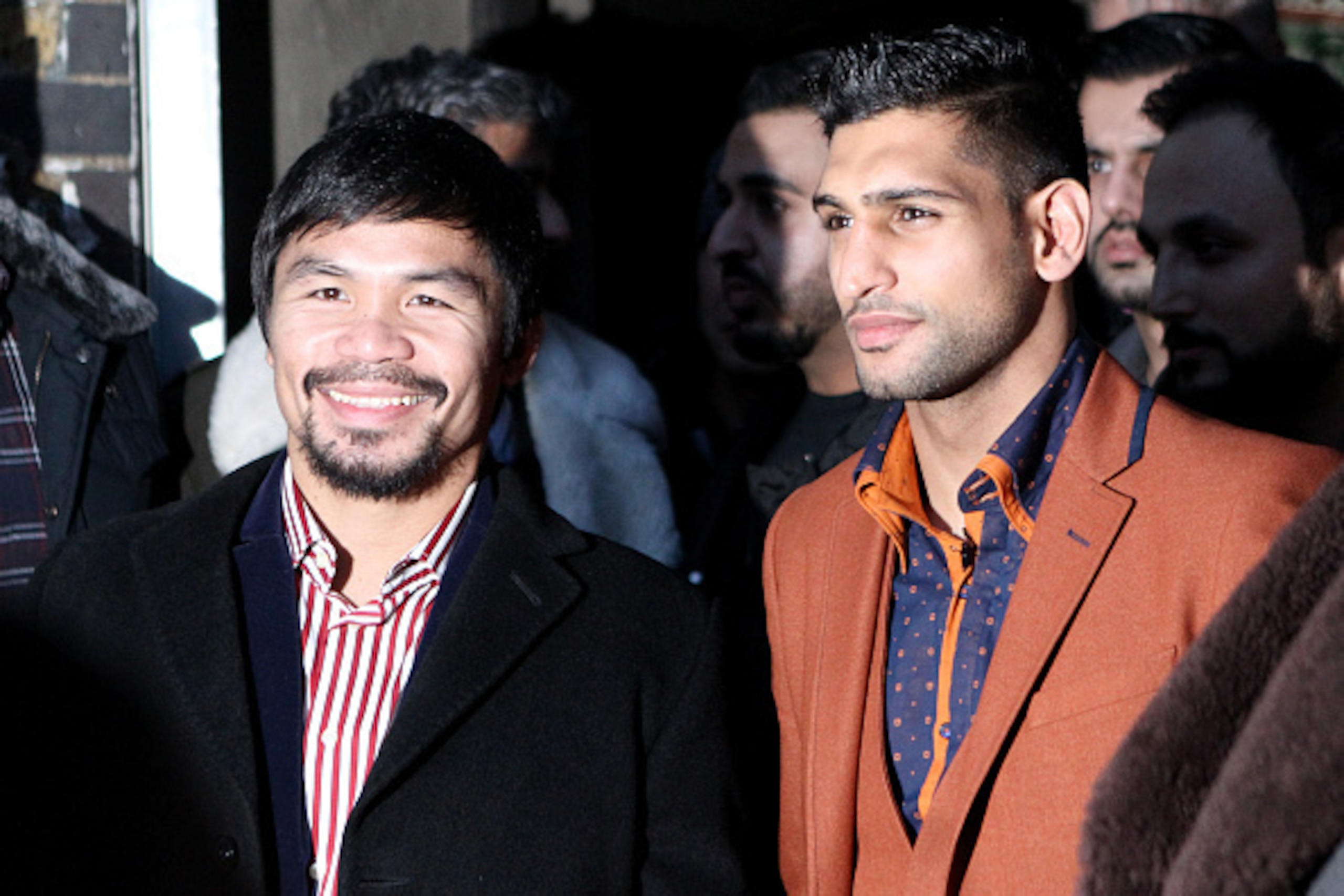 LONDON, ENGLAND - JANUARY 23:  Manny Pacquiao and Amir Khan pose after holding discussions about the possibility of a future fight, at Fitzroy Lodge Amateur Boxing Club on January 23, 2015 in London, England.  (Photo by Martin Willetts/Getty Images)