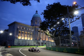 SINGAPORE - SEPTEMBER 20:  Daniil Kvyat of Russia and Scuderia Toro Rosso drives during final practice ahead of the Singapore Formula One Grand Prix at Marina Bay Street on September 20, 2014 in Singapore, Singapore.  (Photo by Clive Mason/Getty Images)