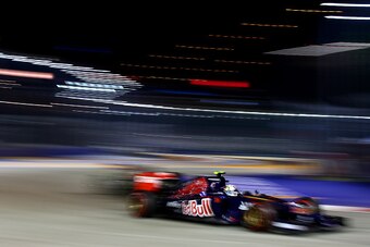 SINGAPORE - SEPTEMBER 21:  Daniil Kvyat of Russia and Scuderia Toro Rosso drives during the Singapore Formula One Grand Prix at Marina Bay Street Circuit on September 21, 2014 in Singapore, Singapore.  (Photo by Mark Thompson/Getty Images)