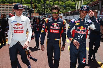 MONTE-CARLO, MONACO - MAY 22:  (L-R) Max Verstappen of Netherlands and Scuderia Toro Rosso, Carlos Sainz of Spain and Scuderia Toro Rosso and Daniel Ricciardo of Australia and Infiniti Red Bull Racing prepare to take part in a Renault Sport RS 01 demonstr