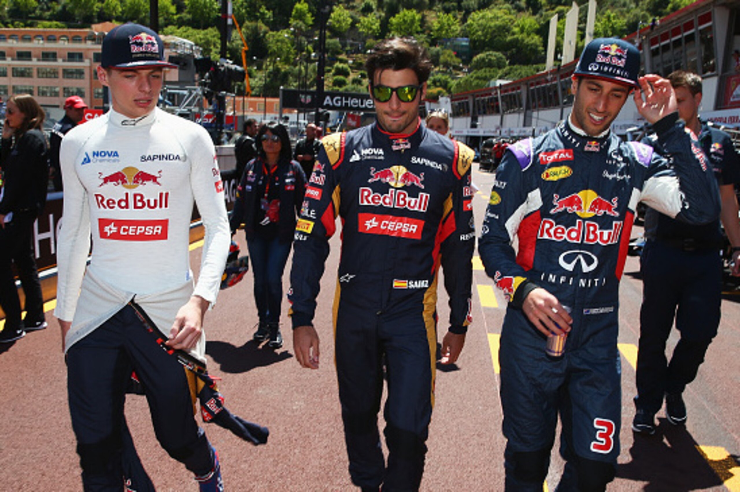 MONTE-CARLO, MONACO - MAY 22:  (L-R) Max Verstappen of Netherlands and Scuderia Toro Rosso, Carlos Sainz of Spain and Scuderia Toro Rosso and Daniel Ricciardo of Australia and Infiniti Red Bull Racing prepare to take part in a Renault Sport RS 01 demonstr