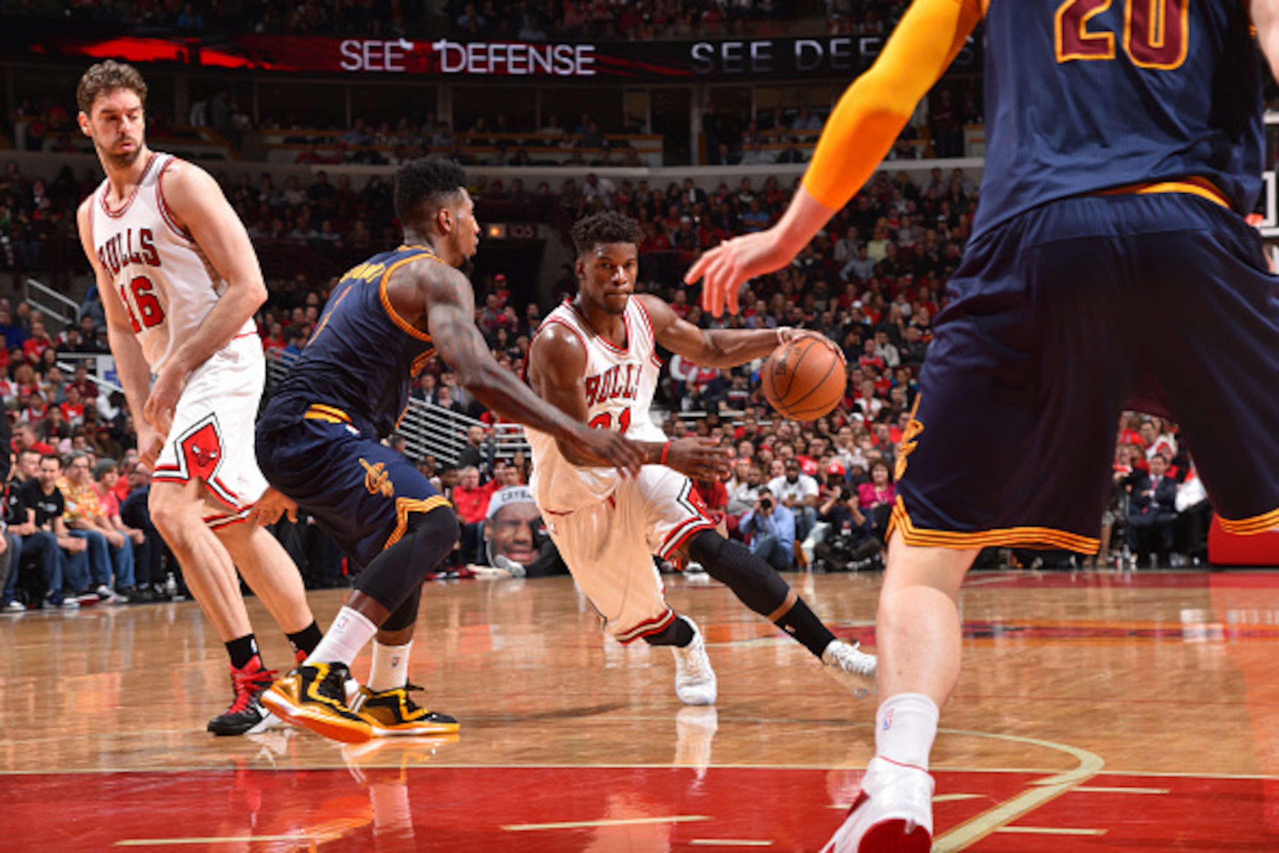 CHICAGO,IL : Jimmy Butler #21 of the Chicago Bulls drives to the basket against the Cleveland Cavaliers at the United Center During Game Six of the Eastern Conference Semifinals during the 2015 NBA Playoffs on May 14, 2015 in Chicago,Illinois NOTE TO USER