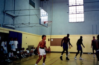 Inside one of the older UCLA pickup games with Jim Farmer (shirtless), Shaquille O'Neal (middle) and Sedale Threatt (right).