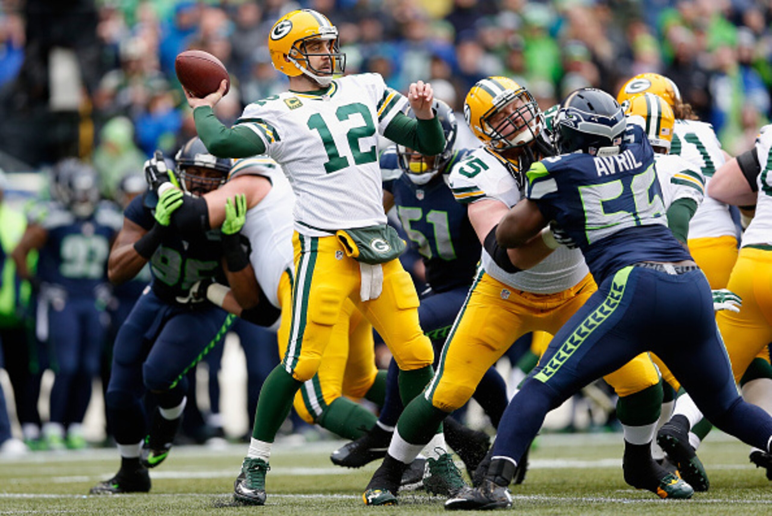 SEATTLE, WA - JANUARY 18:  Quarterback Aaron Rodgers #12 of the Green Bay Packers in action during the 2015 NFC Championship game against the Seattle Seahawks at CenturyLink Field on January 18, 2015 in Seattle, Washington. The Seahawks defeated the Packe