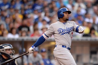 Sep 5, 2015; San Diego, CA, USA; Los Angeles Dodgers left fielder Carl Crawford (3) hits an RBI double during the fourth inning against the San Diego Padres at Petco Park. Mandatory Credit: Jake Roth-USA TODAY Sports