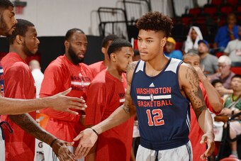 LAS VEGAS, NV - JULY 12: Kelly Oubre Jr. #12 of the Washington Wizards is introduced before the game against the D-League Selects on July 12, 2015 at the Cox Pavilion in Las Vegas, Nevada.  NOTE TO USER: User expressly acknowledges and agrees that, by dow