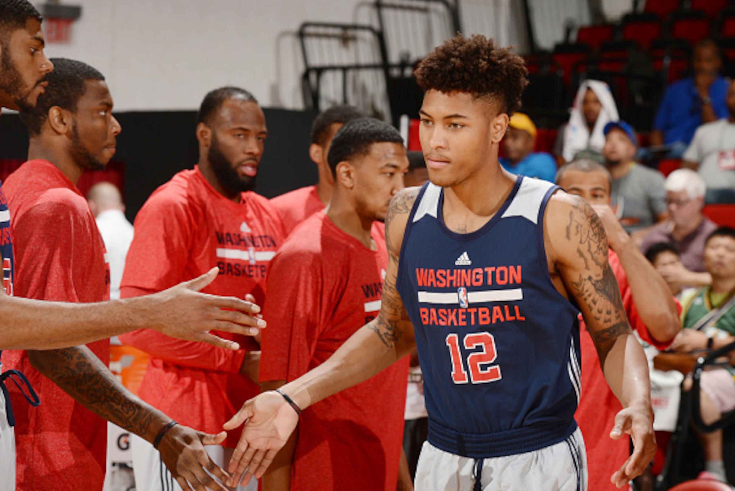 LAS VEGAS, NV - JULY 12: Kelly Oubre Jr. #12 of the Washington Wizards is introduced before the game against the D-League Selects on July 12, 2015 at the Cox Pavilion in Las Vegas, Nevada. NOTE TO USER: User expressly acknowledges and agrees that, by dow LAS VEGAS, NV - JULY 12: Kelly Oubre Jr. #12 of the Washington Wizards is introduced before the game against the D-League Selects on July 12, 2015 at the Cox Pavilion in Las Vegas, Nevada. NOTE TO USER: User expressly acknowledges and agrees that, by dow