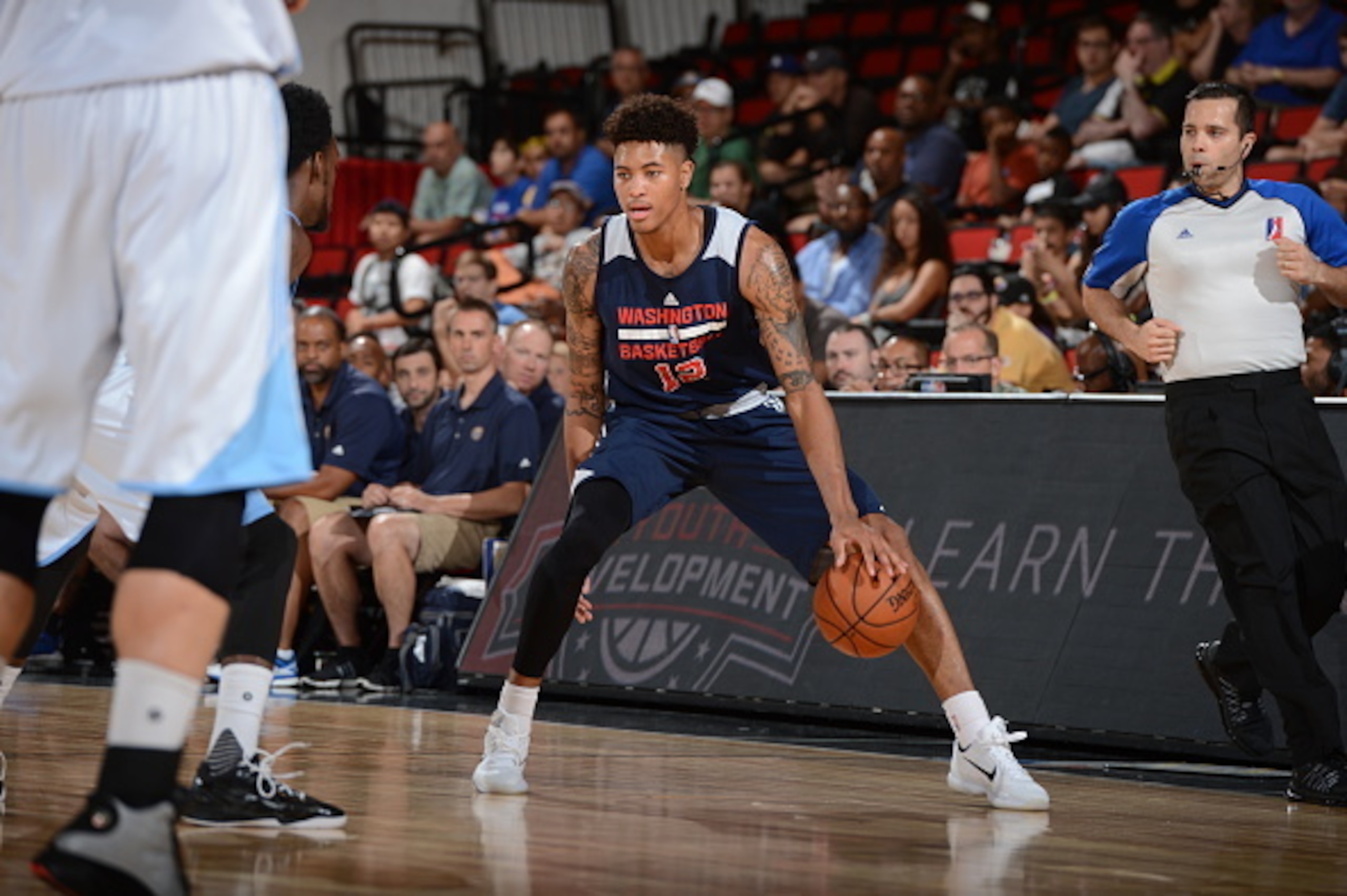 LAS VEGAS, NV - JULY 17: Kelly Oubre Jr. #12 of the Washington Wizards dribbles the ball against the Denver Nuggets on July 17, 2015 at Cox Pavilion in Las Vegas, Nevada. NOTE TO USER: User expressly acknowledges and agrees that, by downloading and or us LAS VEGAS, NV - JULY 17: Kelly Oubre Jr. #12 of the Washington Wizards dribbles the ball against the Denver Nuggets on July 17, 2015 at Cox Pavilion in Las Vegas, Nevada. NOTE TO USER: User expressly acknowledges and agrees that, by downloading and or us
