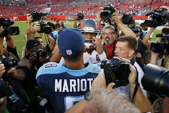 TAMPA, FL - SEPTEMBER 13: Jameis Winston #3 of the Tampa Bay Buccaneers and Marcus Mariota #8 of the Tennessee Titans meet after the game at Raymond James Stadium on September 13, 2015 in Tampa, Florida. The Titans defeated the Bucs 42-14. (Photo by Joe R