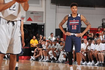 LAS VEGAS, NV - JULY 16:  Kelly Oubre Jr. #12 of the Washington Wizards looks on during the game against the New Orleans Pelicans on July 16, 2015 at The Cox Pavilion in Las Vegas, Nevada. NOTE TO USER: User expressly acknowledges and agrees that, by down
