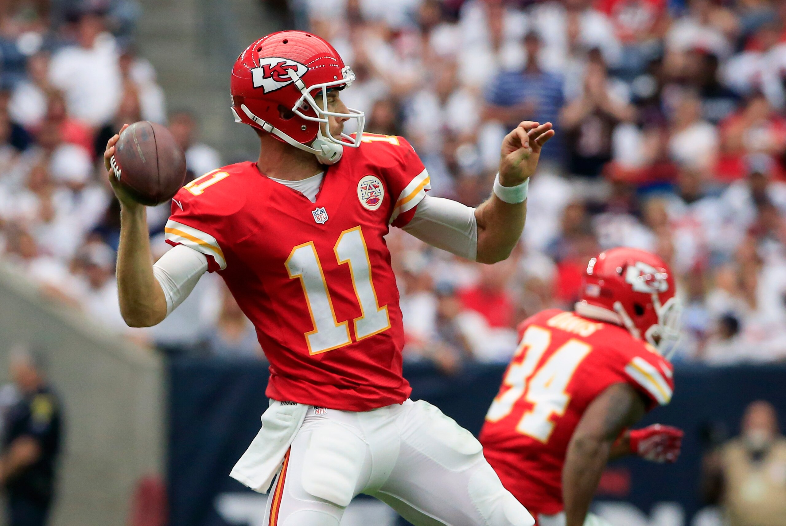 Sep 13, 2015; Houston, TX, USA; Kansas City Chiefs quarterback Alex Smith (11) throws during the game against the Houston Texans at NRG Stadium. Mandatory Credit: Kevin Jairaj-USA TODAY Sports