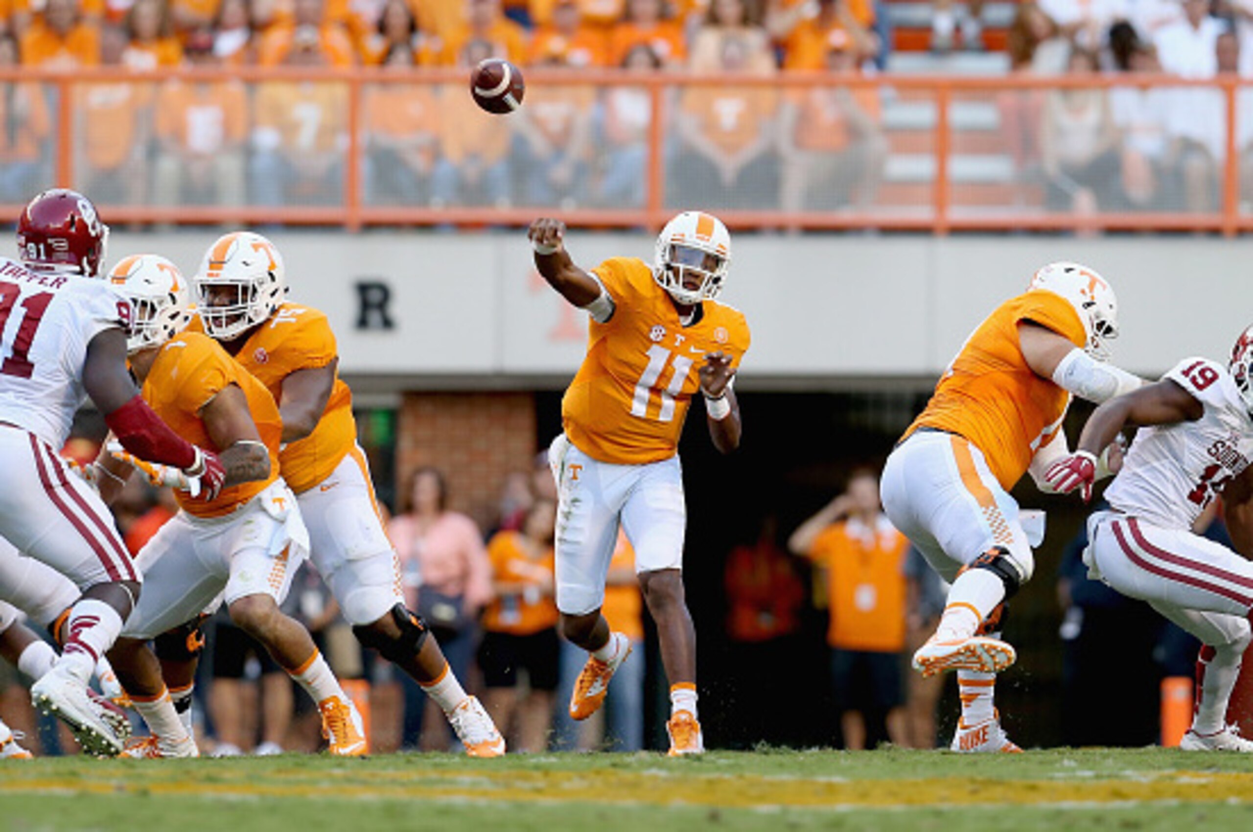 KNOXVILLE, TN - SEPTEMBER 12:  Joshua Dobbs #11 of the Tennessee Volunteers throws a pass against the Oklahoma Sooners during the game at Neyland Stadium on September 12, 2015 in Knoxville, Tennessee.  (Photo by Andy Lyons/Getty Images)
