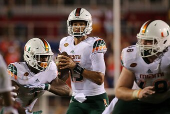 BOCA RATON, FL - SEPTEMBER 11:  Brad Kaaya #15 of the Miami Hurricanes looks to pass during a game against the Florida Atlantic Owls at FAU Stadium on September 11, 2015 in Boca Raton, Florida.  (Photo by Mike Ehrmann/Getty Images)