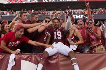PHILADELPHIA, PA - SEPTEMBER 5: Robby Anderson #19 of the Temple Owls celebrates the Owls win over the Penn State Nittany Lions with fans on September 5, 2015 at Lincoln Financial Field in Philadelphia, Pennsylvania.  The Owls defeated the Nittany Lions 2