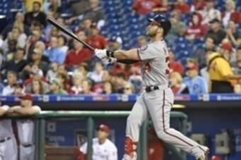 Sep 15, 2015; Philadelphia, PA, USA; Washington Nationals right fielder Bryce Harper (34) watching the ball of his solo home run during the first inning against the Philadelphia Phillies  at Citizens Bank Park. Mandatory Credit: Eric Hartline-USA TODAY Sp