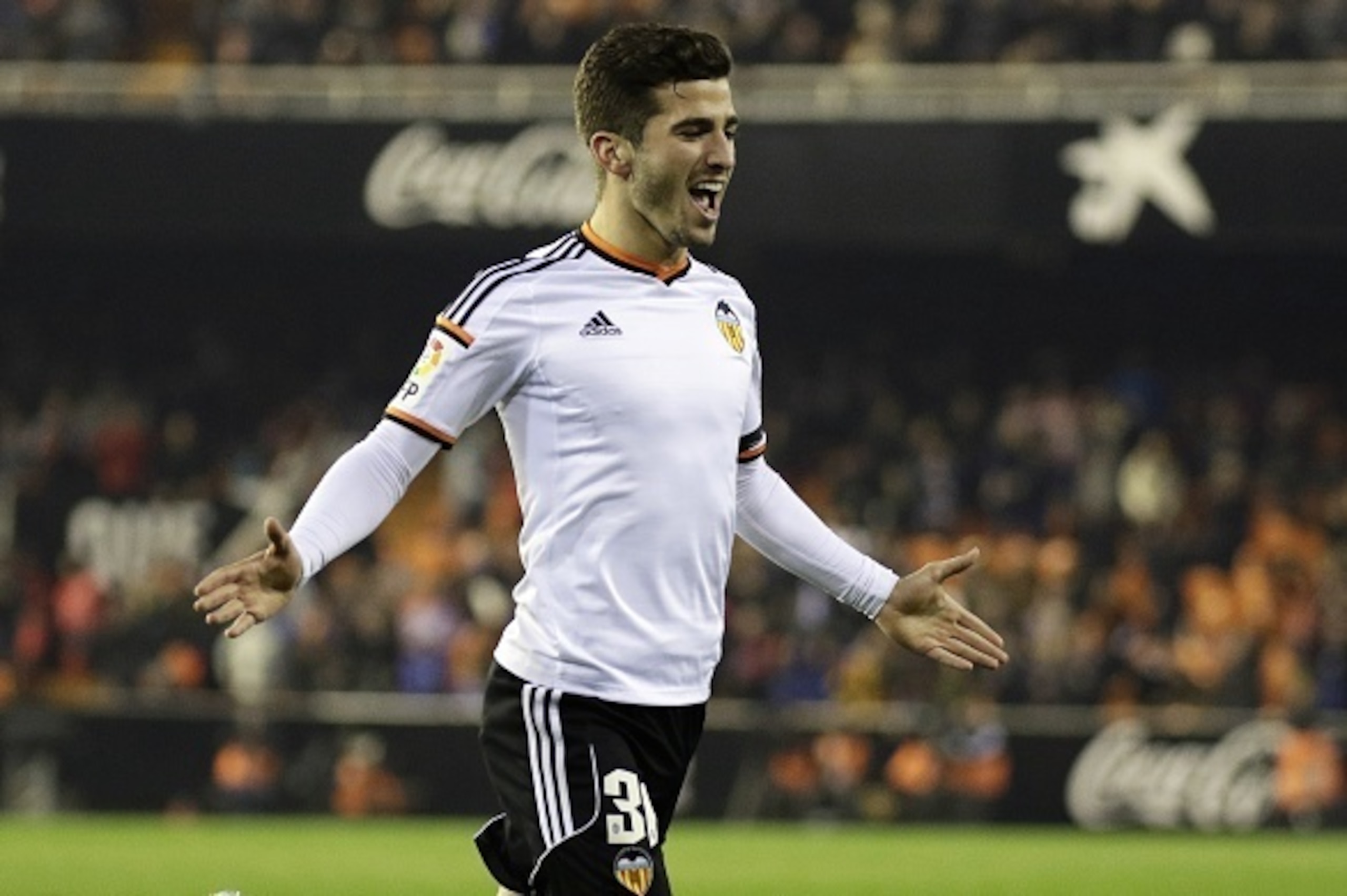 Valencia's defender Jose Gaya celebrates his goal during the Spanish Copa del Rey (King's Cup) round of 16 first leg football match Valencia CF vs RCD Espanyol at the Mestalla stadium in Valencia on January 7, 2015.     AFP PHOTO/ JOSE JORDAN        (Phot